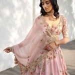 Soft pink raw silk lehenga set.